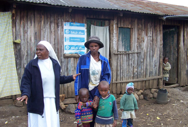 Mother and her children - Sr. Matthew in Gikomo slum